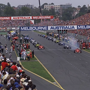 2001 QANTAS AUSTRALIAN GRAND PRIX - Race: Michael Schumacher and Rubens Barrichello lead off from the front row on the parade lap, prior to the start