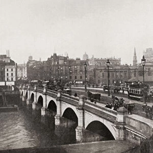 The Broomielaw Bridge over the River Clyde, Glasgow, Scotland in the late 19th century. From The Business Encyclopedia and Legal Adviser, published 1920