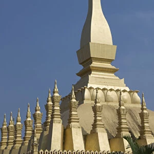 Laos, Vientiane, Pha That Luang, Architectural detail of a golden rooftop