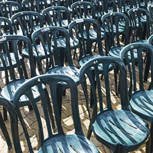Plastic Green Chairs Lined Up In Rows; Malaga Province, Andalusia, Spain