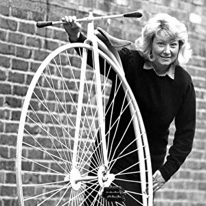 Auctioneer Barbara Turner with an old but in good condition penny farthing