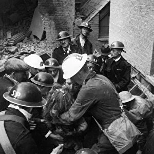 Blitz, London. Girl is dragged from the rubble on Endell Street during the Second World