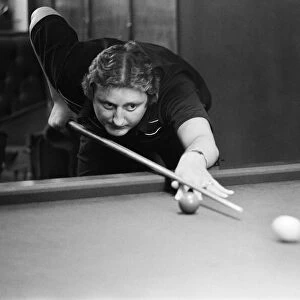 British dart player Eric Bristow pictured at the pub, enjoying a game of snooker