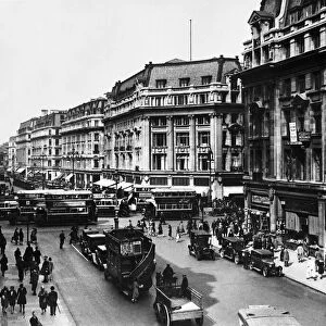 Busy scene in Central London showing the traffic at Regent Street and Oxford Street