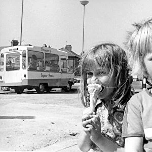 These children are enjoying an ice cream on a sunny day in June 1975