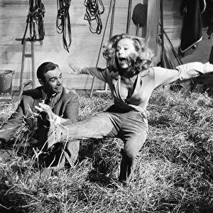 Honor Blackman as Pussy Galore and Sean Connery as James Bond seen here filming a fight