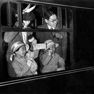 A Japanese family leaving Euston station to return home to Japan June 1940
