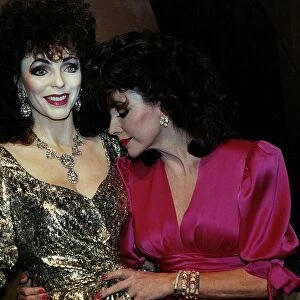 Joan Collins inspects her waxwork model at Madame Tussauds March 1989