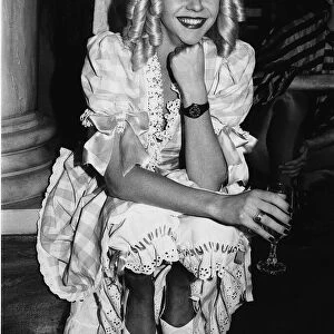 Leslie Ash Actress dressed in costume of nursery rhyme character Little Miss Muffet takes