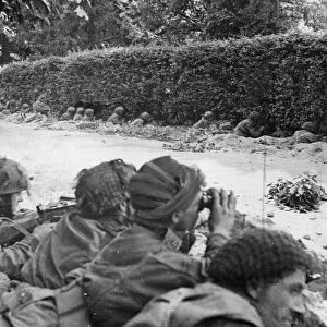 Men of C. Company, the Border Regiment, waiting to repulse a German attack
