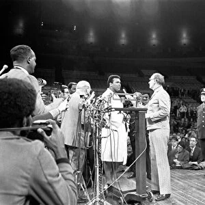 Muhammad Ali on the scales ahead of his first fight with Joe Frazier December 1972