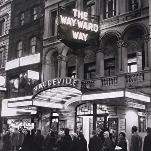 Neon lights advertise the play "The Wayward Way"