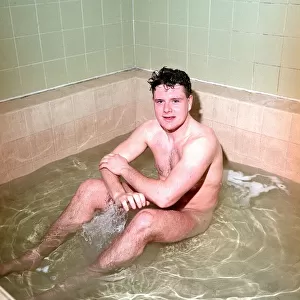 Newcastle United footballer Paul Gascoigne in the bath naked in the dressing rooms at St
