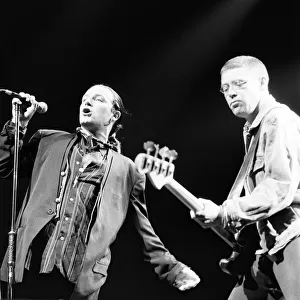 Rock group U2 in concert in USA. Bono and Adam Clayton on stage. May 1987
