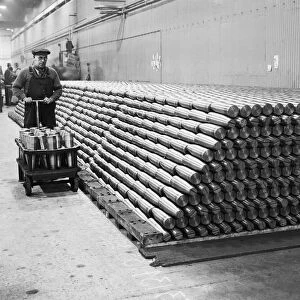Stacking shells for anti-aircraft guns in a midland shell factory. 4th October 1939
