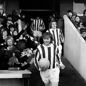 Terry Conroy of Stoke, leads the team out, at the Victoria Ground, March 1972