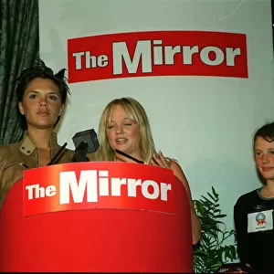 Victoria Adams and Emma Bunton of The Spice Girls May 1999 present award at The