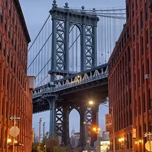 Cityscape of Manhattan Bridge from Brooklyn in New York City at twilight