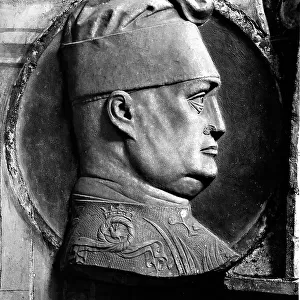 Sculpted medallion with a bas-relief of the profile of Filippo Maria Visconti. Detail of the entrance portal of the Certosa di Pavia