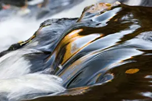 Abstract of cascade in mountain stream, Cumbria, England