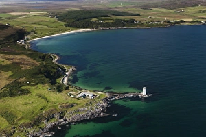 Aerial view of coastline and lighthouse, Carraig Fhada Lighthouse, Port Ellen, Isle of Islay, Inner Hebrides, Scotland