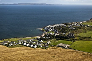 Aerial Prints: Aerial view of coastline and village