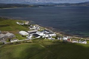 Industry Prints: Aerial view of coastline with village and whisky distillery
