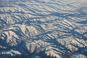 Aerial Prints: Aerial view of snow covered mountain range, Afghanistan, november
