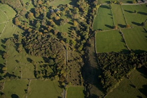 Aerial Prints: Aerial view of wooded valley and farmland