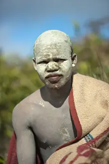 Tribes Prints: AmaPondo (Xhosa) boy wrapped in rugs with white clay (I-Futa) on face