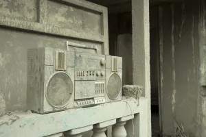Javan Prints: Ash covered portable music system in house damaged from recent volcanic eruption