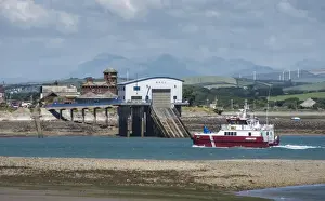 Supply Prints: Assister offshore tug and supply ship entering port through Piel Channel