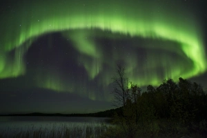 Northern Europe Prints: Aurora Borealis and stars over lake at night, Muonio, Lapland, Finland, September