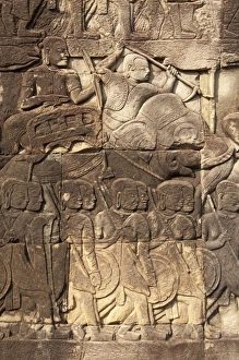 Carving Prints: Bas-relief of elephant and soldiers in Khmer templ Bayon, Angkor Thom, Siem Riep, Cambodia