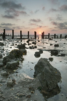 Sun Set Prints: Beach and breakwaters at low tide