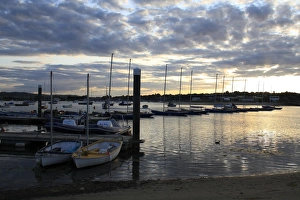 Moored Prints: Boats in harbour at sunset, Bembridge Harbour, Bembridge, Isle of Wight, England, june