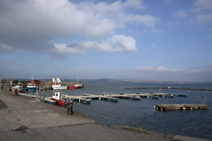 Quay Prints: Bowmore harbour and Lochindaal on isle of Islay, Scotland