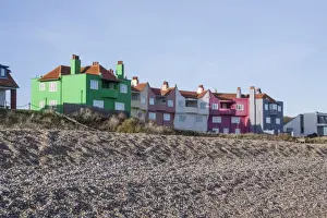 Colour Prints: Brightly coloured houses by shingle beach at Thorpeness Suffolk