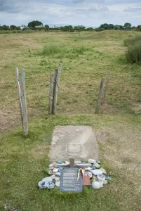 Site Prints: Burial site of slave on unconsecrated ground near coastal village, only community on U. K