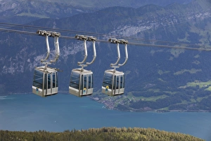 Cableway over mountain lake, Lake Thun, Niederhorn, Swiss Alps, Bernese Oberland, Switzerland, august