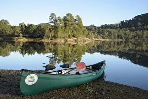 Canoe Prints: Canoe on shore of freshwater loch