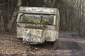 Track Prints: Caravan abandoned beside track at edge of woodland, Skane, Sweden