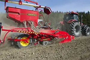 Case 225 CVX tractor with Vaderstad Rapid A 600S seed drill, drilling arable field, Upplands Vasby, Sweden, may