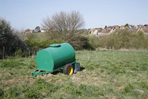 Supply Prints: Cattle farming, water bowser in pasture