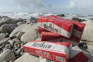 Environmental Prints: Cigarettes washed up on beach after container spill