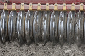 Cultivating Prints: Close-up of disc harrows, cultivating arable field, Sweden, may