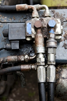 Pipes Prints: Close-up of hydraulic connections on farm tractor, Cumbria, England, august