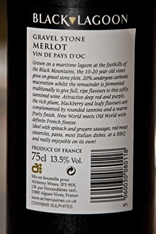 Glass Prints: Close-up of Merlot wine bottle label, showing alcohol content and recycling symbol