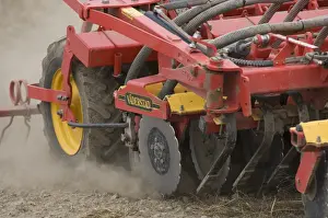 Drill Prints: Close-up of Vaderstad seed drill, drilling wheat crop, Sweden, autumn
