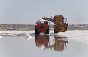 Collected Prints: Commercial salt production, machinery collecting salt from saltpans